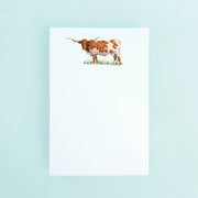 Taylor Paladino Standing Texas Longhorn in A field of Bluebonnets Notepad